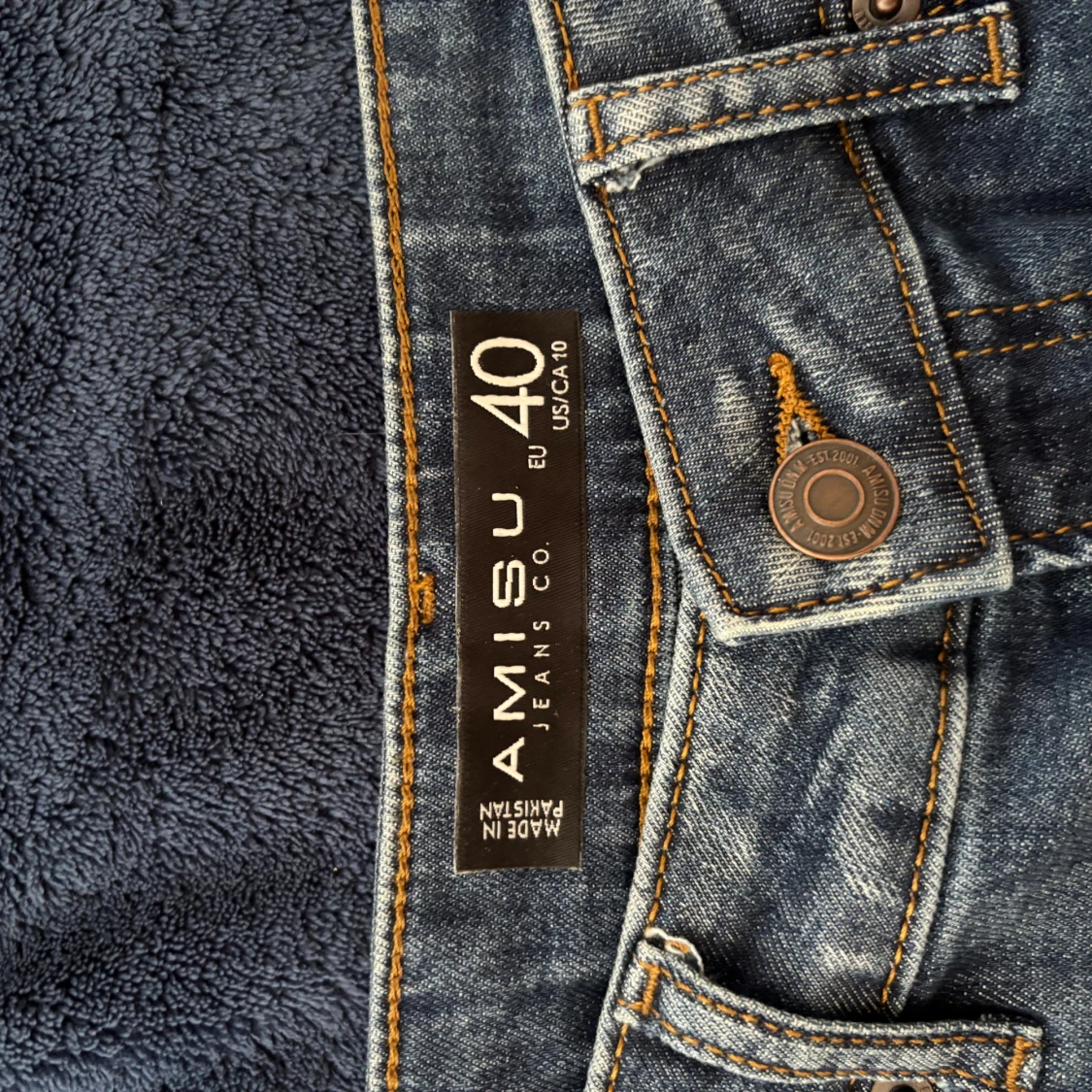 Blå bootcut jeans från Amisu, stl 40 - 4