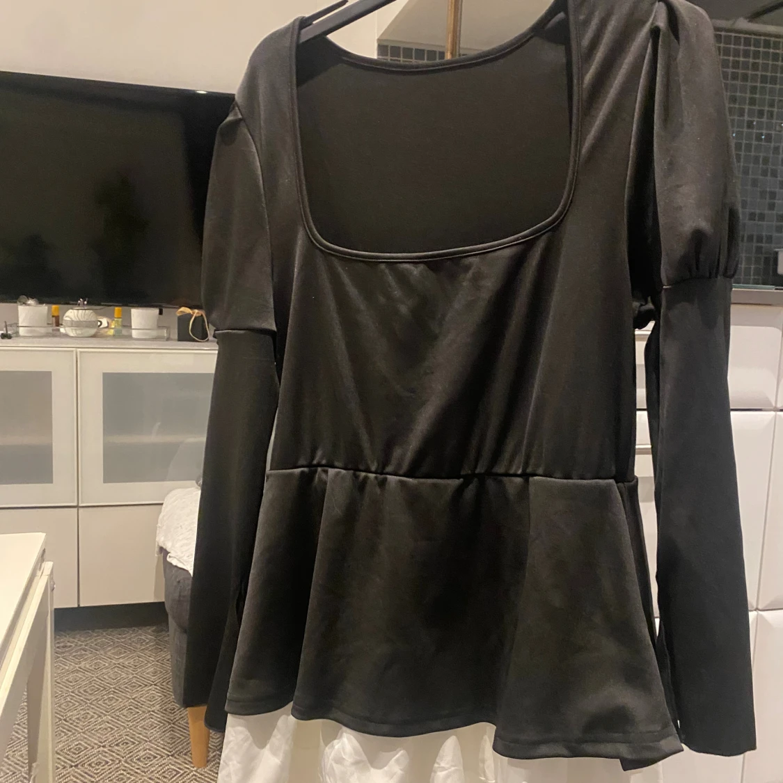 Svart långärmad peplumtop - 1