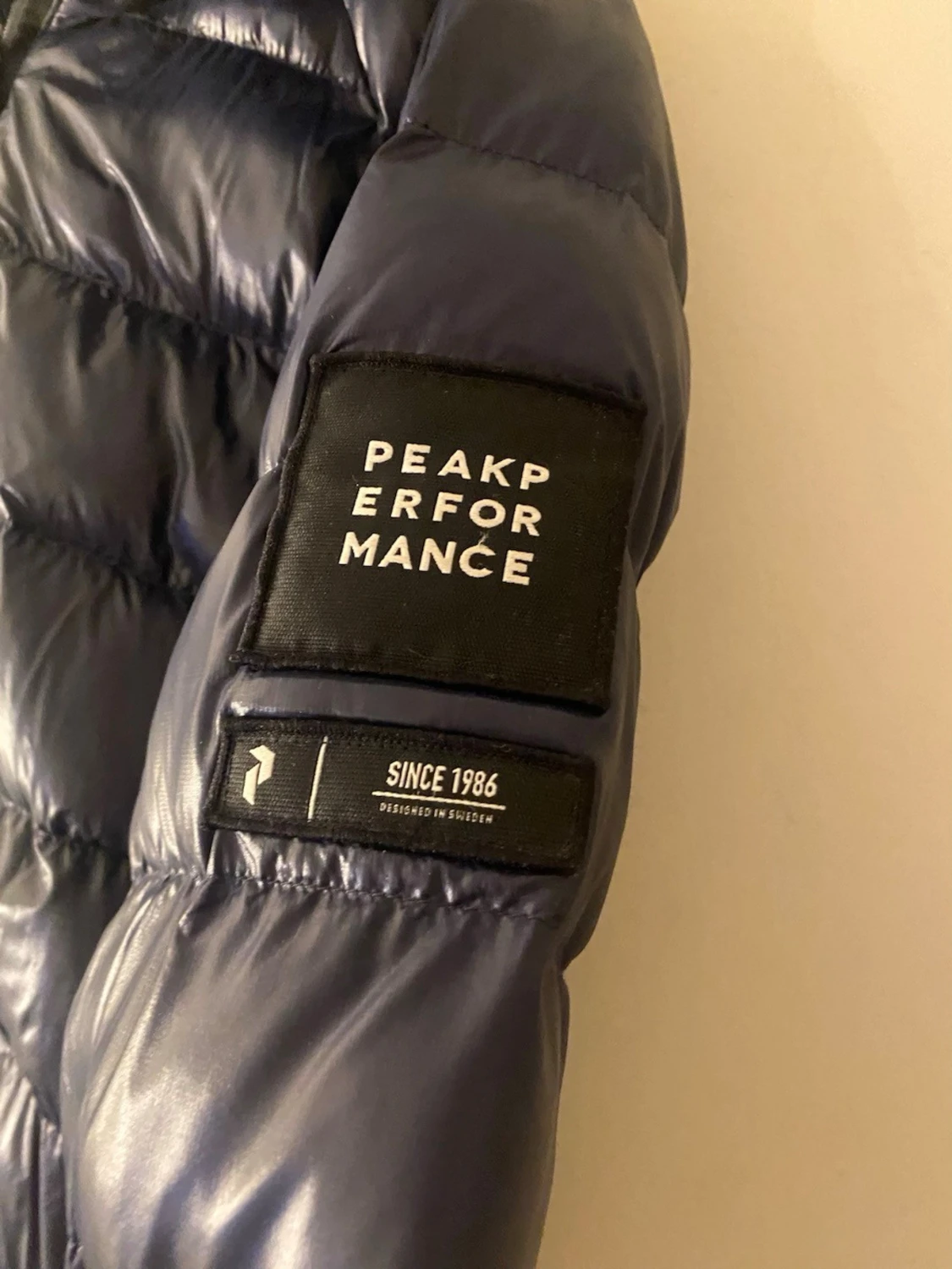 Mörkblå dunjacka Peak Performance - 1