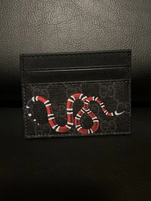 Orm plånbok  - Plånbok med en orm på