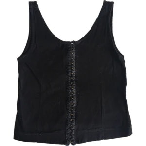 Vintage korsett-topp/ toppar/ linnen/ cyber/ y2k/ 2000tal - Cool vintage topp med massa spännen, lite ”korsett liknande”