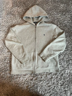 Ralph lauren zip up - Light grey Ralph Lauren zip up that I’m selling because it’s to small now. The price can be discussed for a quick deal.