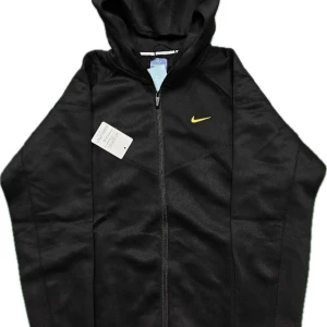 Nike NOCTA - Brand new Nike x NOCTA tracksuit in black with yellow accents. Includes both hoodie and pants with tags attached. * Condition: 10/10 • Color: Black Fast and careful shipping