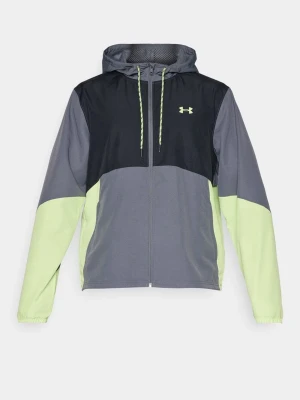 Under Armour vindjacka med huva - Snygg vindjacka från Under Armour i grått, svart och ljusgrönt. Jackan har huva med snörning, dragkedja framtill och logga på bröstet. Perfekt för träning utomhus och har en sportig vibe.