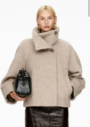 Arket kappa - Endast använd en gång. Storlek 36. 