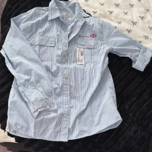 skjorta/blå - till ” saleout ” 