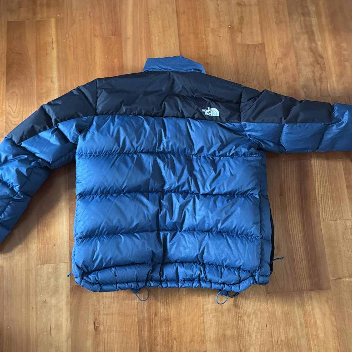 Blå dunjacka från The North Face - 1