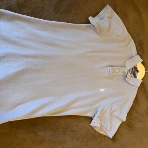 Ralph lauren pike - Ljusblå piké i mycket bra skick. Storlek S slim fit