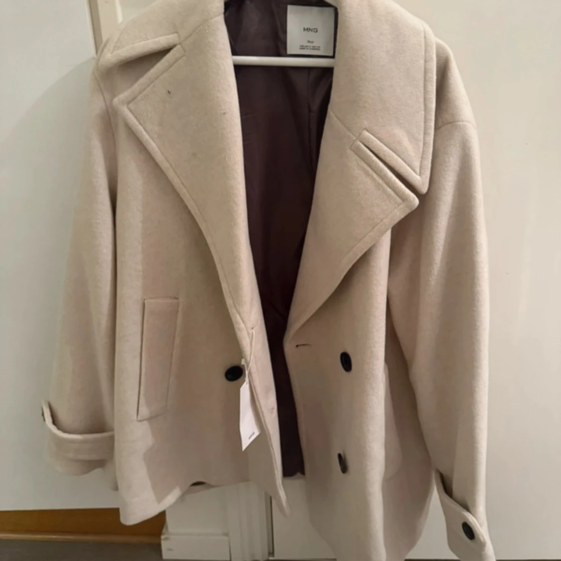 Beige skepparkavaj från MNG i ull