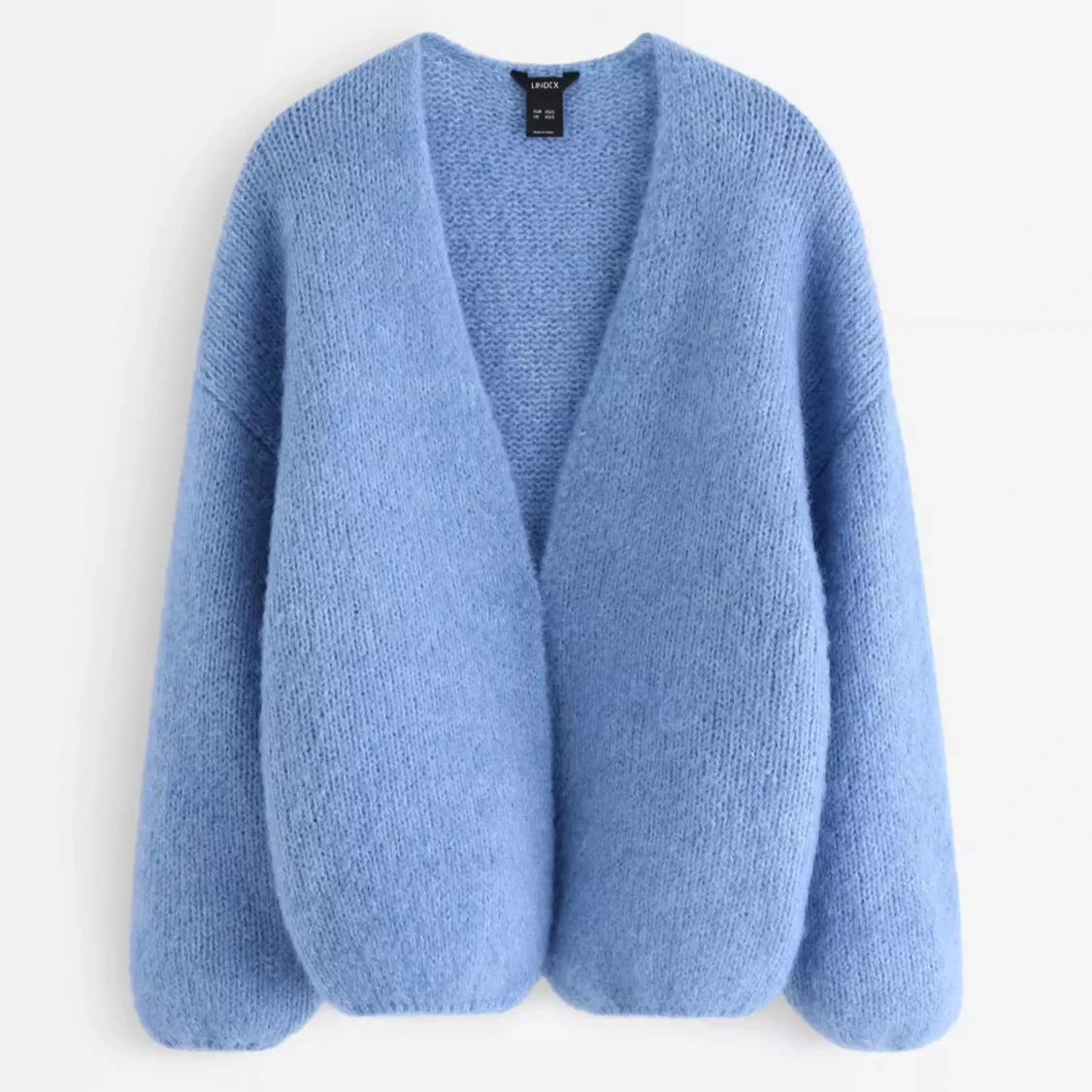 Blå stickad kofta från Lindex