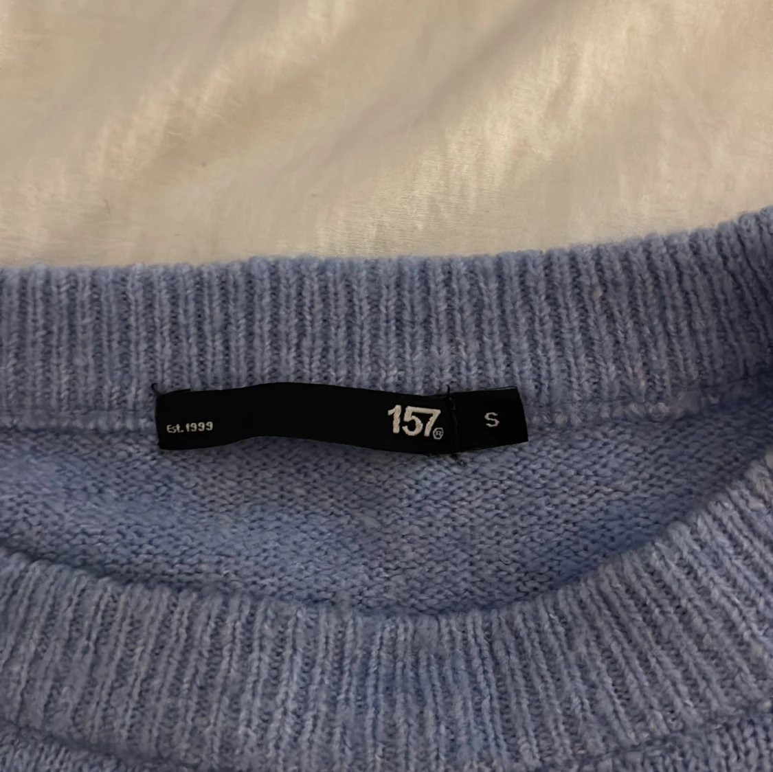 Ljusblå stickad tröja från 157 - 2