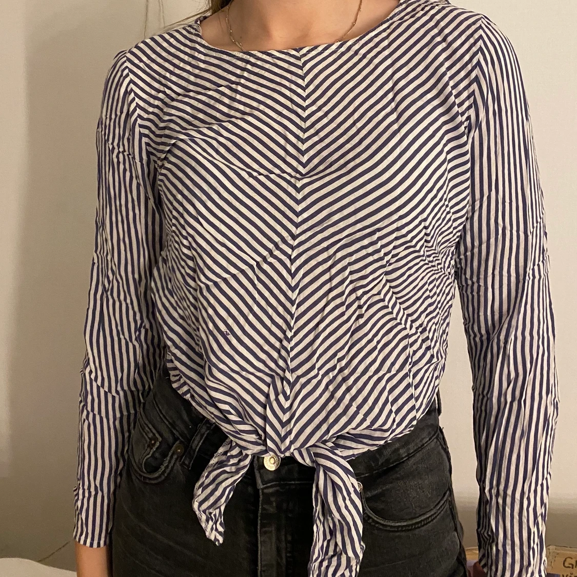 Randig blus i storlek 40