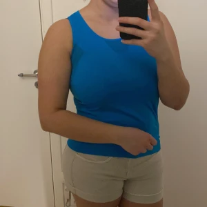 Träningstopp - Träningstopp helt oanvänd i storlek M