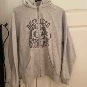 Reckless grey zip-up hoodie in good condition 