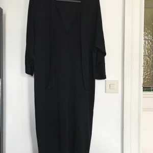 Filippa K Klänning - Som ny. Storlek L passar mindre med. 