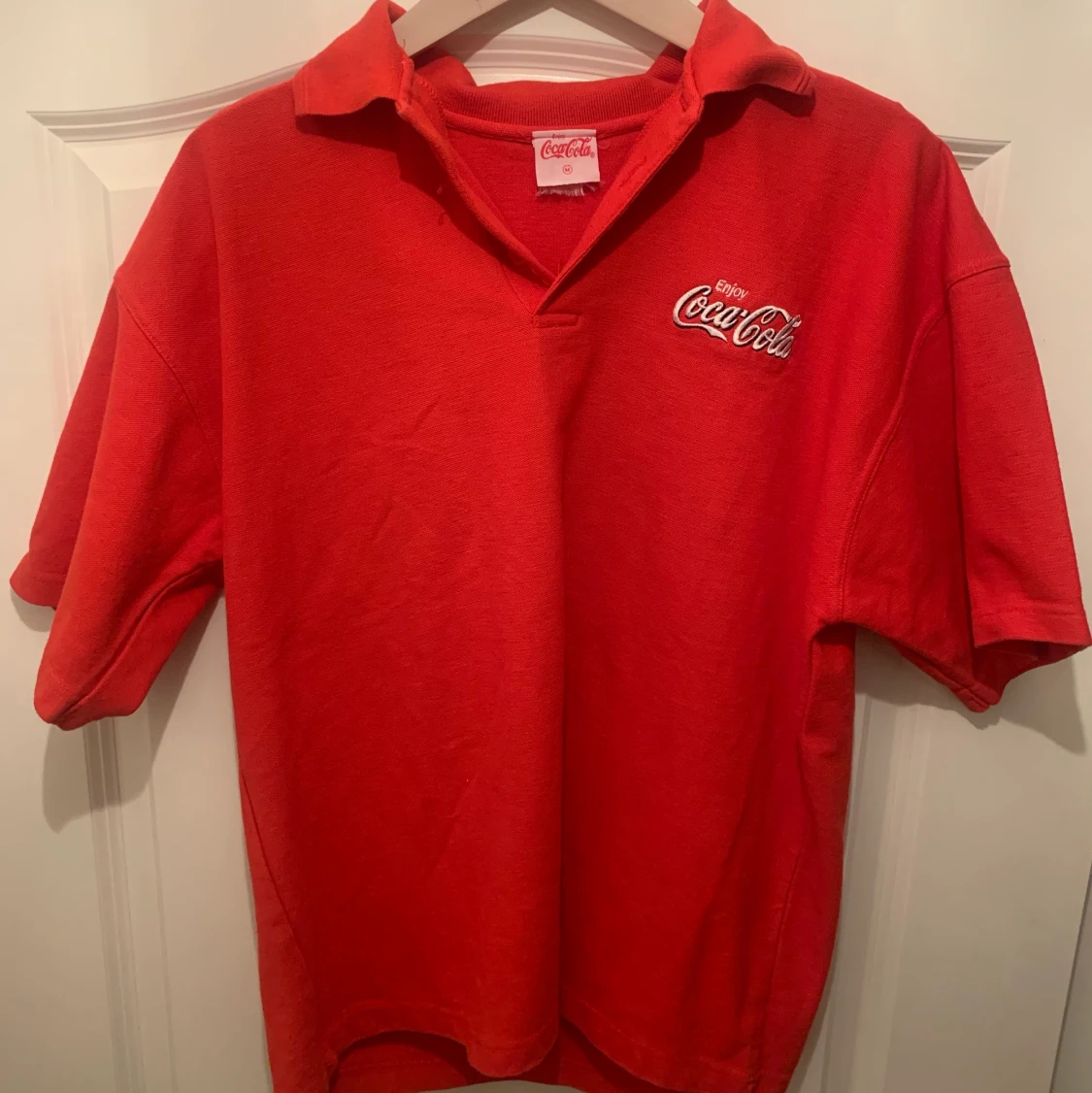 Coca cola pikétröja 