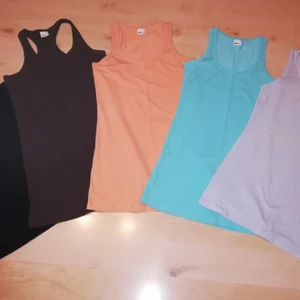 5st Fina Långa Linnen Gina Tricot. Stl.M  - Paket med Fem stycken fina och välvårdade Linnen från Gina Tricot. Lång modell i Fina Sommar färger.. Svart/Brun/Aprikos/Turkos/Ljusblå.  Är i skön och stretchig bomulls kvalitet. Se bilder..  Sparsamt anv. ett fåtal ggr. Mycket fina och välvårdade. Hela och rena. Är nästan i Nyskick! (ord.pris i butik var 99kr/st) ... Finns i Älmhult, kan skickas med Spårbar frakt avg. med Post.  Har Swish.. Mvh Petronella