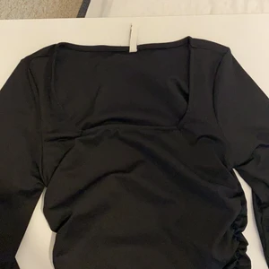 Rynkad klänning - En fin rynkad svart klänning den bubbleroom. Inte använd