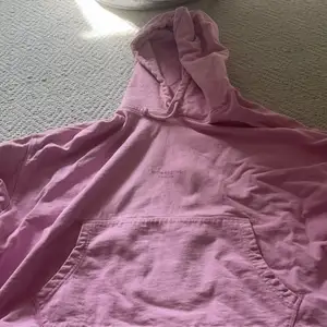 Snygg rosa acne hoodie.