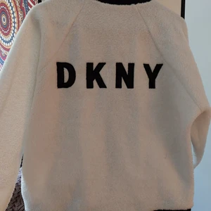 New jacket DKNY - Never used, mint condition, bought in London, will fit both S and M. Can sand pictures on me if interested 