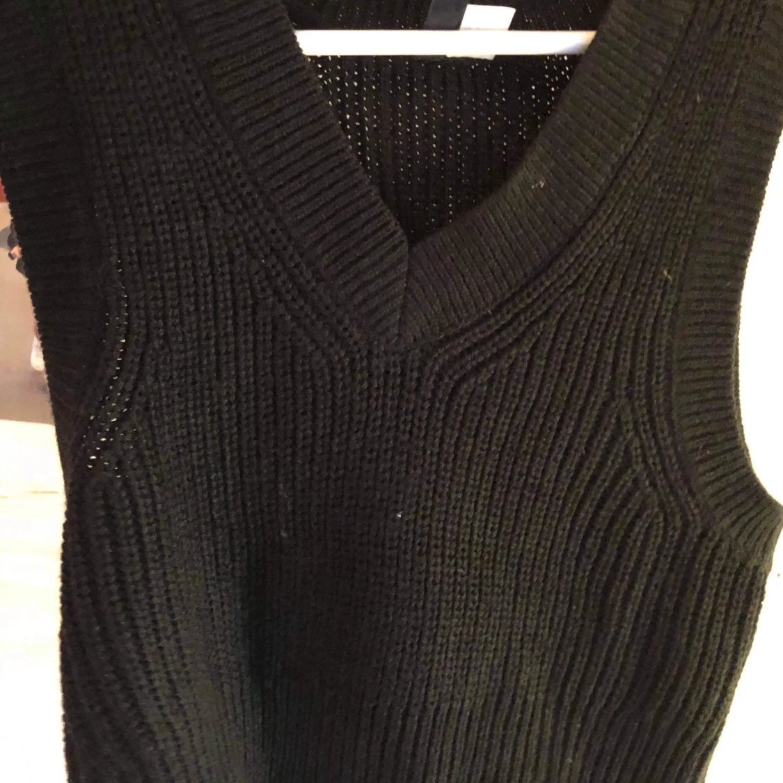 Svart stickad väst - 90