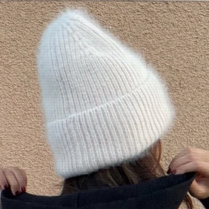 FWSS mössa - Intressekoll. Endast använd fåtal gånger! Väldigt fluffig och skön. 