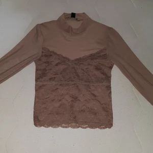 Topp - Fint skick. Toppen är helt ny och oanvänd.