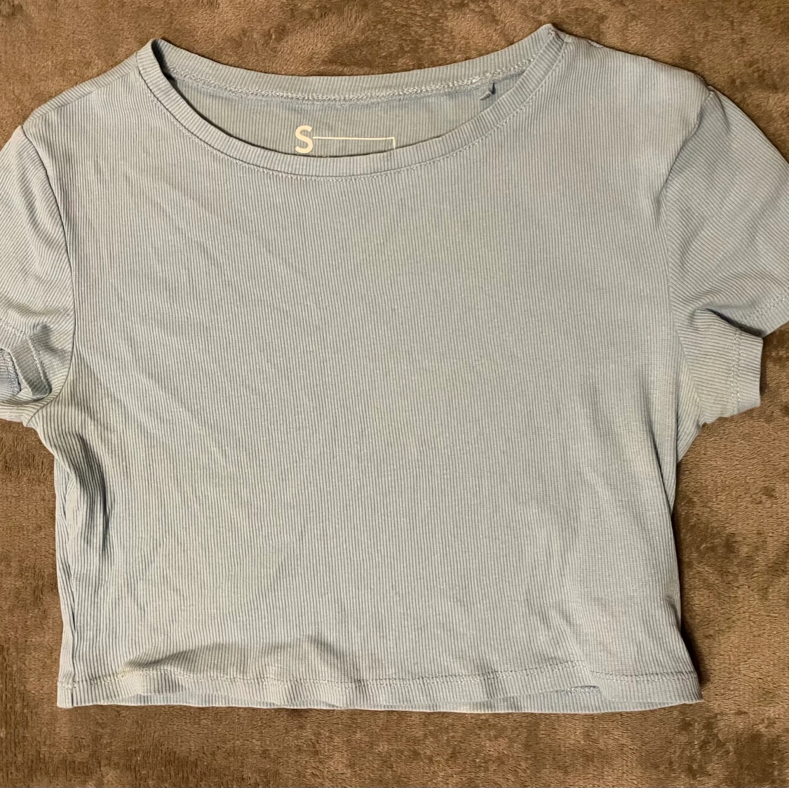 Ljusblå topp, newyourker 