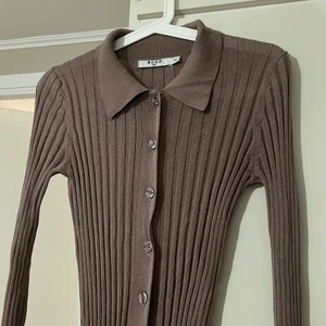 NAKD kofta, xxs - En tajt kofta/klänning som använts endast ett par gånger, jättefint skick.