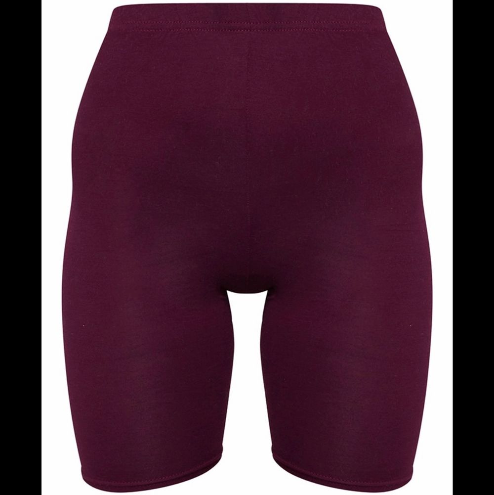 Bought from second hand. Tag size US 6 / EU 36. “bike shorts are an essential for the new season and we are loving this basic style. Featuring a maroon jersey material, team them with a maroon hue cropped sweater for a look we're loving.” No holes, tears, rips, stains, fading. Label and care instructions tags removed cuz they’re itchy. Smoke and pet free storage space. No other flaws to note. Disclaimer: Please expect some general wear in all secondhand pre-owned items as they have lived a previous life, so do not expect a mint item. . Shorts.