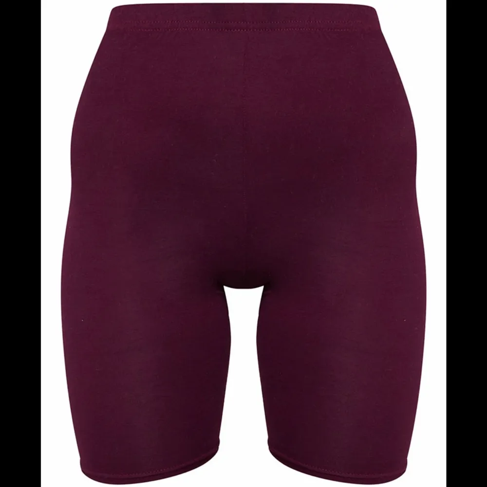 Bought from second hand. Tag size US 6 / EU 36. “bike shorts are an essential for the new season and we are loving this basic style. Featuring a maroon jersey material, team them with a maroon hue cropped sweater for a look we're loving.” No holes, tears, rips, stains, fading. Label and care instructions tags removed cuz they’re itchy. Smoke and pet free storage space. No other flaws to note. Disclaimer: Please expect some general wear in all secondhand pre-owned items as they have lived a previous life, so do not expect a mint item. . Shorts.