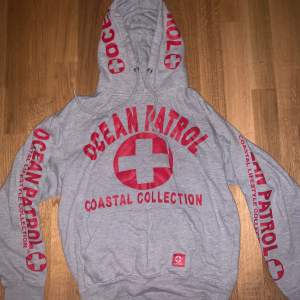 Ocean Patrol hoodie från costal collection i ocean city i usa.