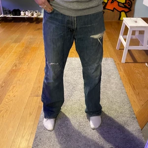 Baggy jeans - Köpta second hand. Väldigt stora men funkar med bälte. 