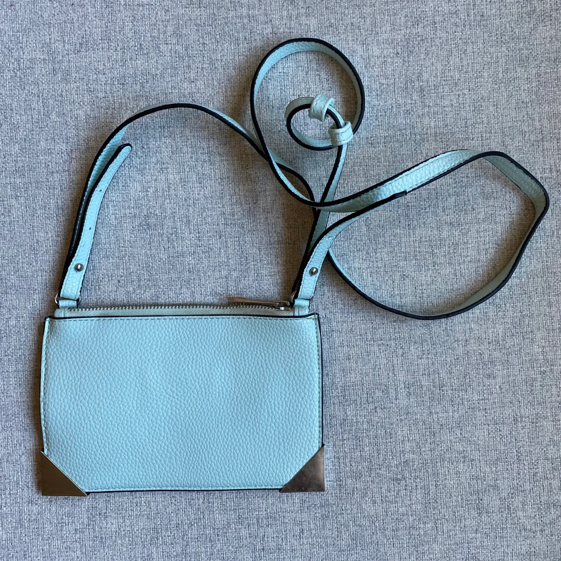 Liten väska i ljusturkos