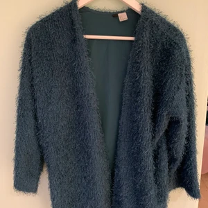 Kofta  - Fin kofta i grönblå som är himla skön men inte används. 