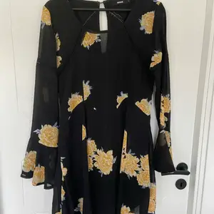 Floral dress from bikbok! very cute and the skirt comes out in an A line shape. 