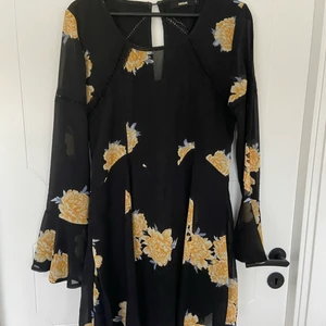 BikBok skater dress - Floral dress from bikbok! very cute and the skirt comes out in an A line shape. 