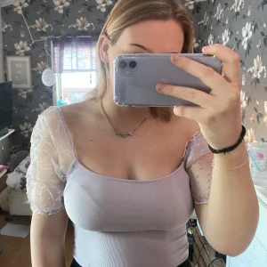 Topp från amisu  - Lila topp från amisu som använd fåtal gånger!