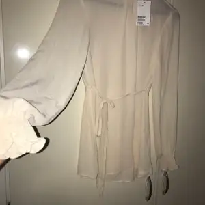 beige blouse new by H&M premiumselection 
