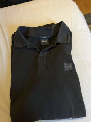 Hugo boss piké - En jättefin piké i mycket bra skick och inga defekter 