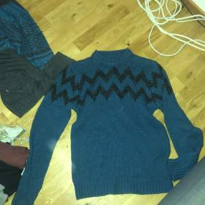 A large blue sweater 