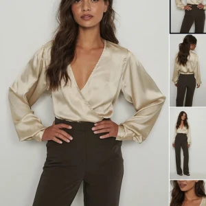 Elegant satinblus - Superfin roseguldig satinblus från NA-KD. Aldrig använd, slutsåld på hemsidan💫✨