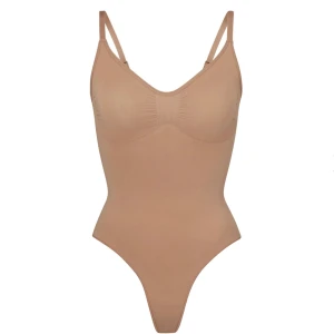 skims  - bodysuit ifrån skims, i färgen sienna. aldrig använd bara testat på. 