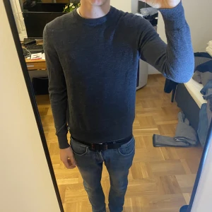 Stickad - Stickat Merinoulltröja Trussardi Bra skick