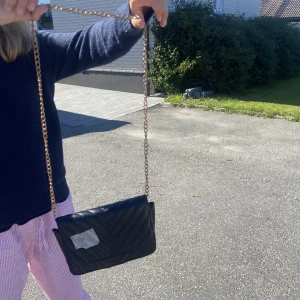 Väska - Skriv för frågor