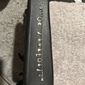 Smycken  - Vet inte om det är armband eller fot länk, äkta silver med stämpel, har används.