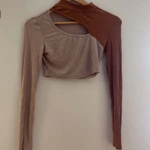 Topp - Magtröja, fraktas eller hämtas tyresö