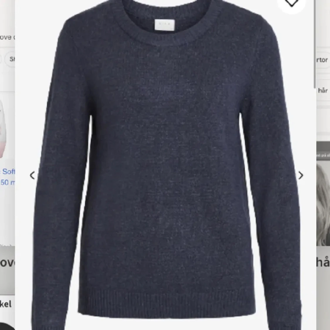 Marin blå stickad tröja