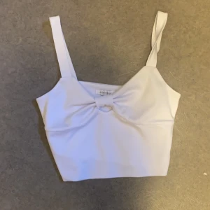 Topp - Gullig rosett topp. Storlek xs-s