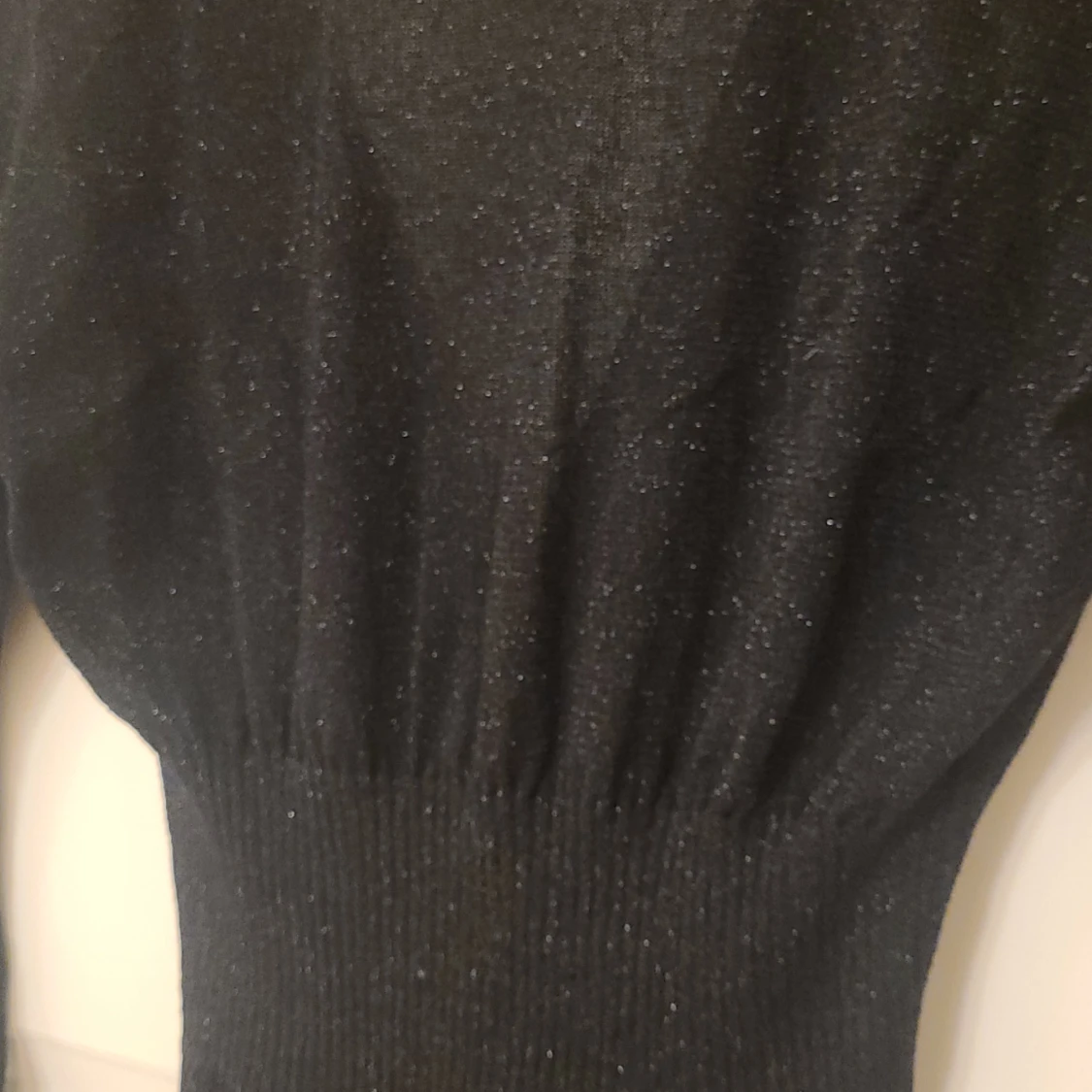 Finstickad glittrande klänning - 91